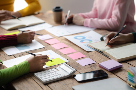 Group businessman attended a meeting with executives of startup companies, startup company sales team meetings, brainstorming and summary of company performance. Business strategy management concept.