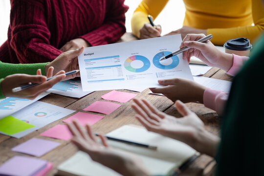 Group businessman attended a meeting with executives of startup companies, startup company sales team meetings, brainstorming and summary of company performance. Business strategy management concept.