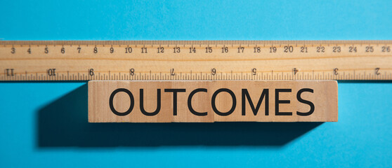 Measuring Outcomes word. Business concept