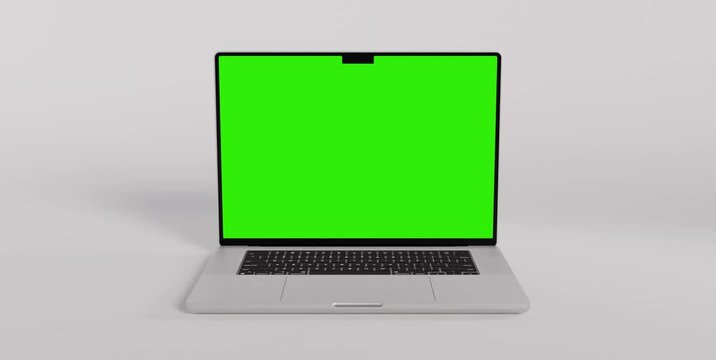 Laptop with blank screen isolated on white background. Macbook blank green screen mockup. 60fps 4k UHD video