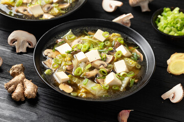 Cabbage Tofu Soup with mushrooms and spring onion.