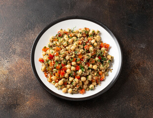 Chickpea Salad with Quinoa, sweet red pepper, herbs and lemon. Healthy food