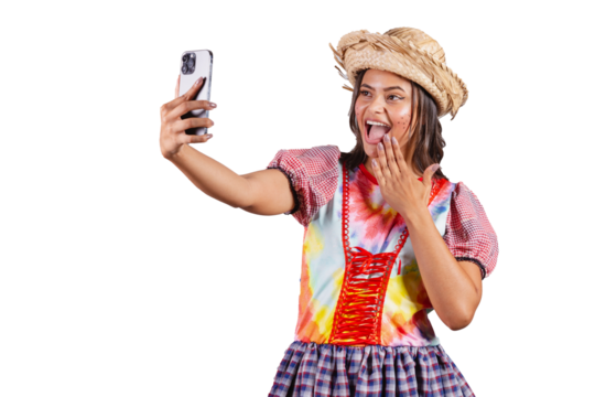 Brazilian woman wearing country clothes, São João party, Junina party. taking self portrait with smartphone, selfie.