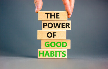 The power of good habits symbol. Concept words The power of good habits on wooden block. Beautiful...