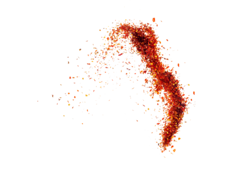 Isolated pepper splashes on a white background. Explosion. Chile. Paprika. Spice. Hot pepper powder. Taste of pepper. Mexican. Element for the design. Flying powder.