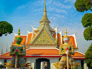 Fototapeta premium The visiting card of the capital of Thailand is the Buddhist temple Wat Arun, Temple of Dawn, which is located on the banks of the Chao Phraya River