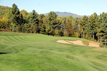 Scenic golf holes in the fall season