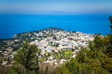 Fototapeta premium View from the Chairlift of Anacapri rooftops with the Tyrrhenian Sea, on the island of Capri, in Campania region, southern Italy.