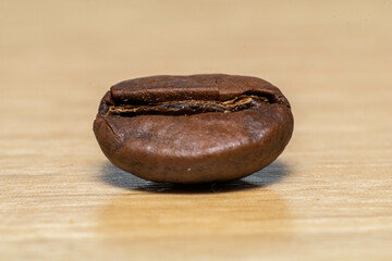 A coffee bean is a seed of the Coffea plant and the source for coffee. It is the pip inside the red or purple fruit. This fruit is often referred to as a coffee cherry