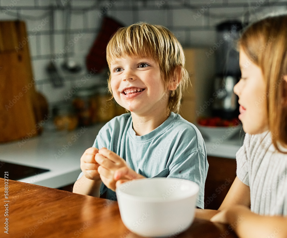 Wall mural child girl boy kid brother sister food breakfast strawberry fruit berry fresh diet vitamin health healthy eating kitchen snack morning