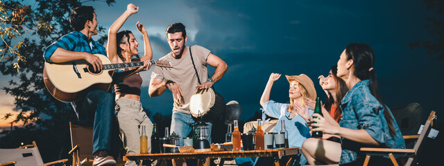 summer party camping of friends group with guitar music, happy young woman and smiling man having fun in vacation holiday, nature outdoors travel of friendship lifestyle together, bar-b-q party time