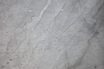 Naklejka premium Silver grey marble with dark grey vertical vein natural slab texture close up