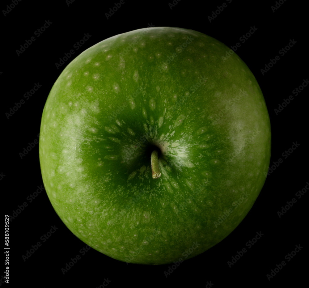 Wall mural Green apple isolated on black, top view - Wall murals