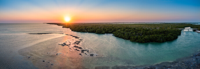Aerial sunset panorama of Saddlebunch Key, in Florida Keys, Florida. - 588117956