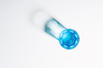 A Glass with Water and Sharp Shadows, Caustic Effect as Light Passes Through