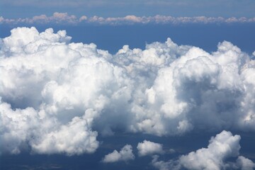 Naklejka na ściany i meble clouds in the sky, view from airplane 