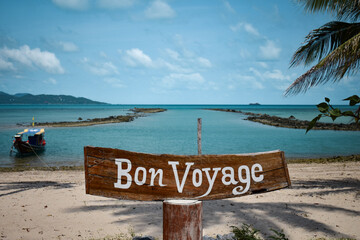 Bon Voyage sign on a paradise island beach in the Gulf of Thailand