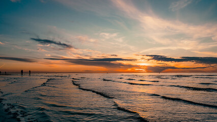 Beautiful warm sunset near the sea