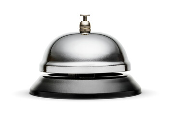 Reception or service bell with a shiny metal surface and a black plastic base. Isolated on white.
