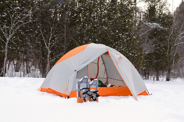 Winter snowshoeing expedition with winter camping