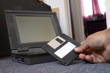 floppy disk in an old laptop