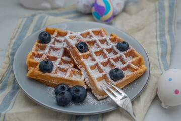sweet home made carrot easter waffles on a table