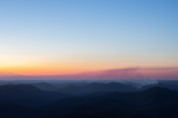 Gradient in Sky with Forest Fire in Distance