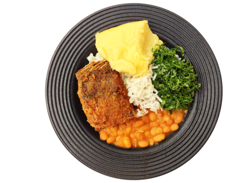 Typical Brazilian daily meal called "prato feito" with traditional ingredientes like a kind of corn porridge called "angu", cabbage, fish, etc