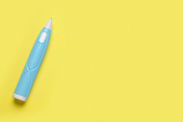 Stylish 3D pen on yellow background, top view. Space for text