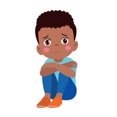 unhappy boy sitting with hands on knees