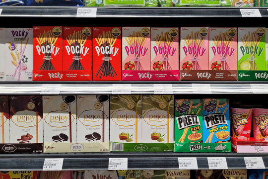 PENANG, MALAYSIA - 2 APR 2023: Pocky and Pretz biscuits from Glico products. Glico is a Japanese company, established in 1919. Now they have become the worldwide confectionary company.