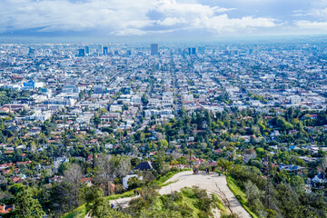 Aerial Panorama cityscape  of Los Angeles California and surrounding Cities with downtown Skyscrapers and urban residential homes