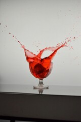 Jakarta, Indonesia – February 21, 2020: High-Speed Photography Technique, Dropping Ice Cubes Into A Glass That Is Already Filled With Water. Selected Focus