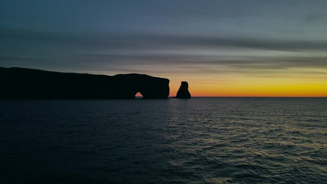 Drone view at sunrise of famous perce rock in Perc&eacute;, Qu&eacute;bec, Canada