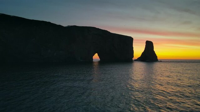 Drone view at sunrise of famous perce rock in Perc&eacute;, Qu&eacute;bec, Canada
