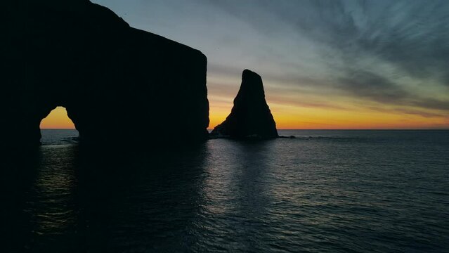 Drone view at sunrise of famous perce rock in Perc&eacute;, Qu&eacute;bec, Canada