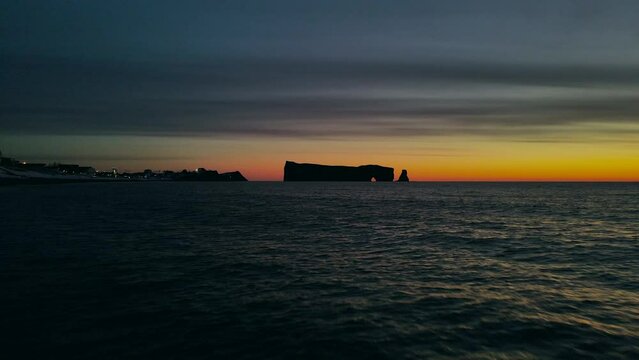Drone view at sunrise of famous perce rock in Perc&eacute;, Qu&eacute;bec, Canada