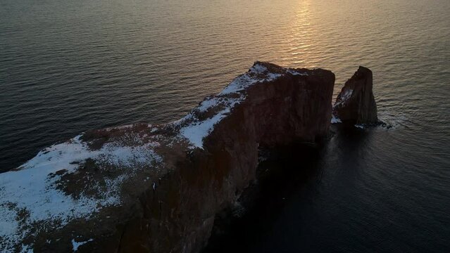 Drone view at sunrise of famous perce rock in Perc&eacute;, Qu&eacute;bec, Canada