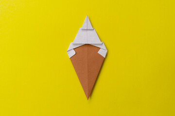 Step by step photo instruction how to make origami big ice cream. Simple diy with kids children's concept. Collage of the steps photo.