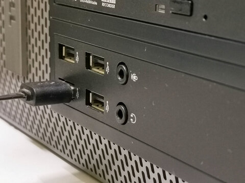 Close up image USB ports on motherboard panel.