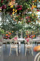 Flower arrangements, chairs, wedding dinners