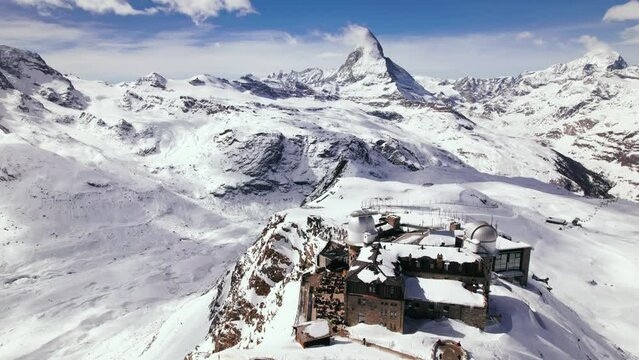 Aerial of Gornergrat on top of swiss alps Matterhorn mountain range in winter