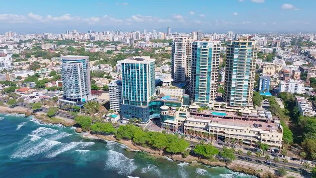Luxury and modern skyscrapers along George Washington avenue and cityscape, Santo Domingo in Dominican Republic. Aerial drone panoramic view