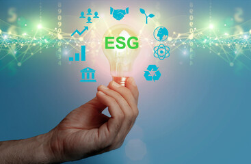 Global ESG technology concept. Man's hand presses a holographic button. Environmental, Social, and Corporate Governance idea.