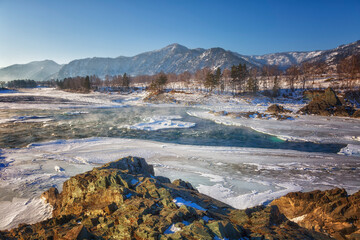 Winter landscape. River in Altai on a sunny day. Russia