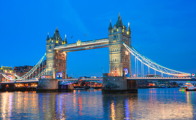 Panorama of the Tower Bridge, Tower of London on Thames river at dusk - London, United Kingdom
