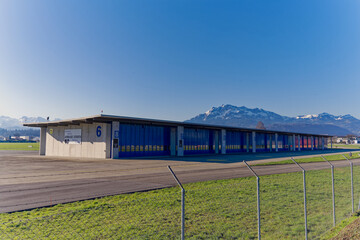 Scenic landscape and Swiss Alps with mount Pilatus seen from City of Emmen, Canton Lucerne, on a sunny spring day. Photo taken March 22nd, 2023, Emmen, Switzerland.