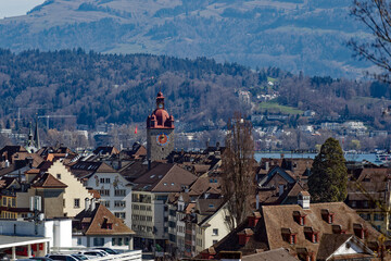 Aerial view of famous Swiss City of Luzern with medieval old town on a sunny spring day. Photo taken March 22nd, 2023, Lucerne, Switzerland.