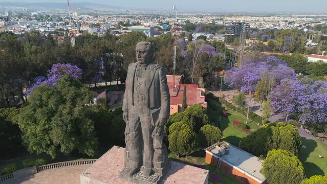 Queretaro, Mexico, 23 03 25, monument to Benito Juarez on top of cerro de las campanas during spring at sunset, aerial view with blue sky