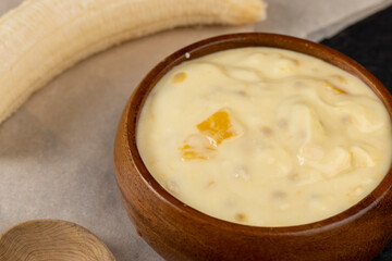 natural yogurt with pieces of fruit and banana flavor
